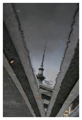  Zipper puddle reflection on concrete