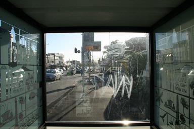 Nick Corlett; The inside of a busstop; This is a photo taken from inside the busstop in three lamps. It looks down Jervois Road