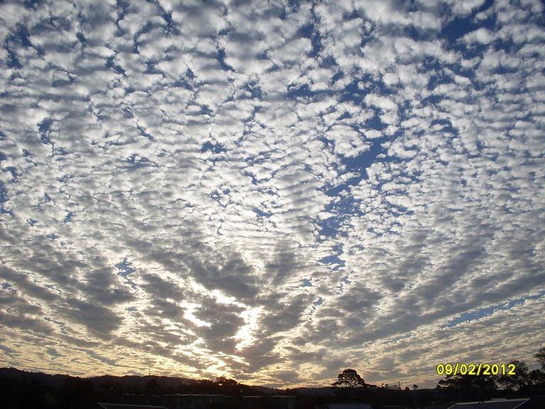 Frenie Perlas; Cloudy Sunset; Sunset over the Waitakere Ranges taken from Glen Eden