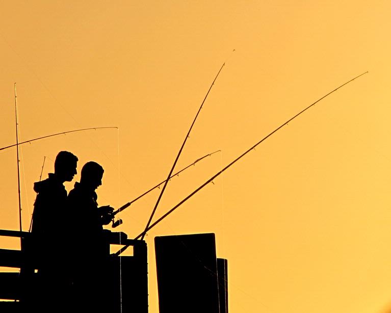 Mirjam van Sabben; Fishermen A Band Of Brothers; Brothers fishing from Cornwallis Wharf at sunrise