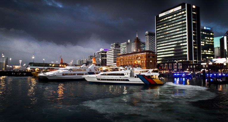 Chris Robinson;Auckland Ferries gathering in the storm;A very early and cold Monday morning. Ferries are arriving at the ferry terminal in Auckland CBD