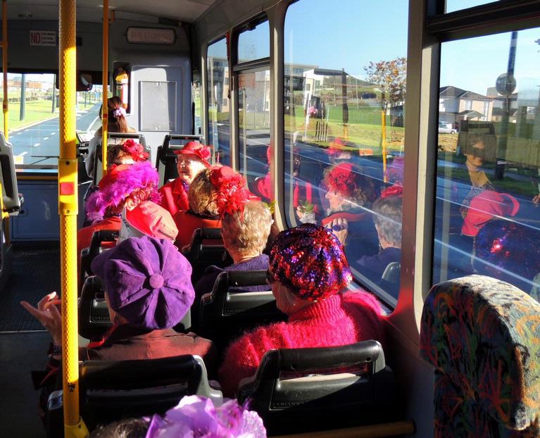 John McKillop; Ladies in Red; Members of Howick's Chapter of the Red Hat Society take the bus to Manukau, before going by train to Swanson for lunch.
