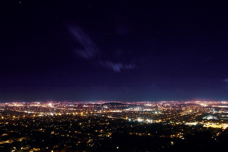 Adrian McBirney; The Night Sky; An evening in Auckland looking west from Mt Eden