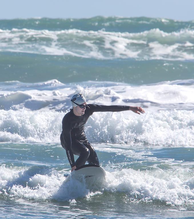 Sam Lu; Surfing; At Muriwai Beach