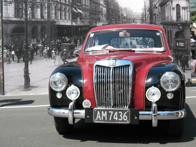 Stuart Weekes;Driving out of Queen St;Elderly MG on anniversary weekend