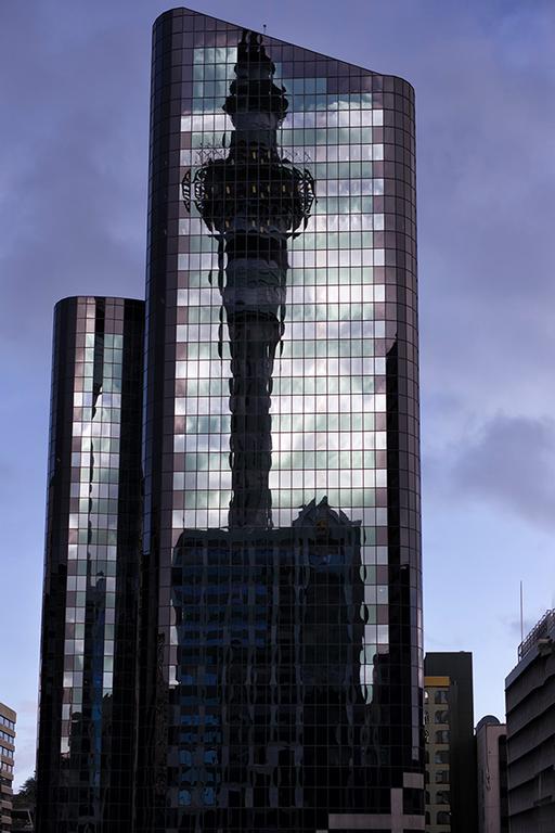  The Sky Tower reflected on a neighboring building