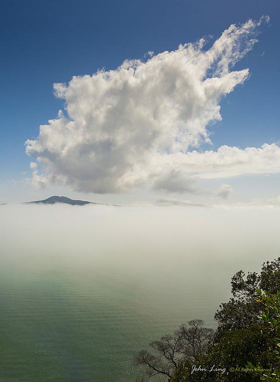 John Ling;Flaming shape Cloud and Misty Morning in Motukorea Channel Rangitoto Island;photo was taken on 14th Sept 2015