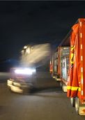 Brett Dickson; Loading Up; A forklift loads freight into a New Zealand Couriers truck at the company’s Auckland depot in Penrose