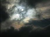 Zelda  Wynn;Sunscape ; Beautiful optics caused by the sun.  Taken looking out tinted window.