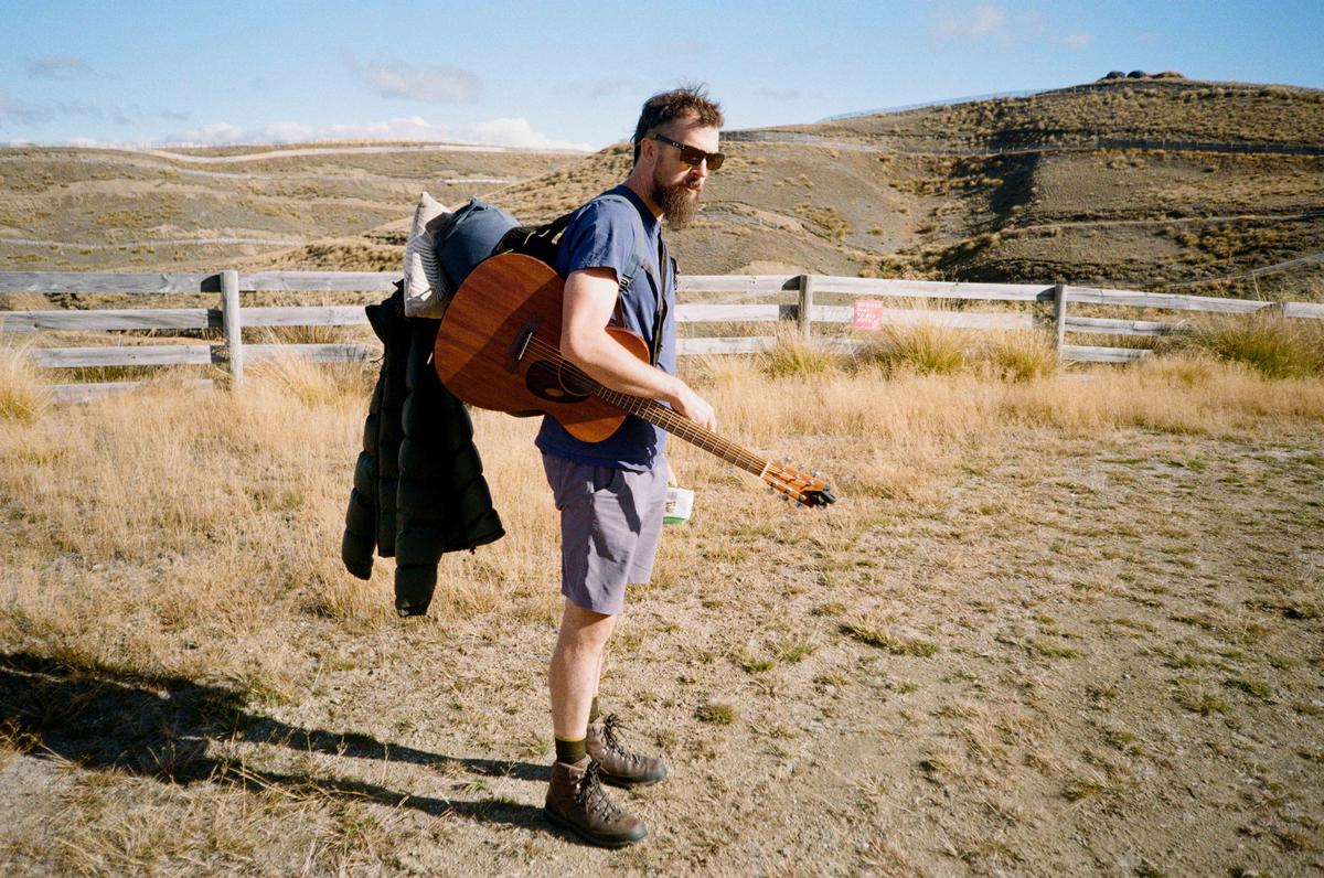 Scott Yeoman;The Troubadour;On a tour from Auckland to Arrowtown, folk singer songwriter Monty Bevins plays gigs on a ferry, in bars, in a festival field for a crowd of hundreds, and in an alpine hut for an audience fewer than 20.