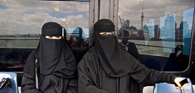 Véronique Cornille: Saudi mother & daughter, wearing abaya, on the Devonport ferry during a visit to family in Auckland