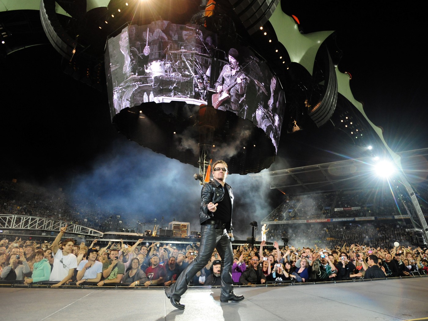 Craig Baxter - U2 frontman Bono salutes the crowd at Mt Smart Stadium in November 2010 