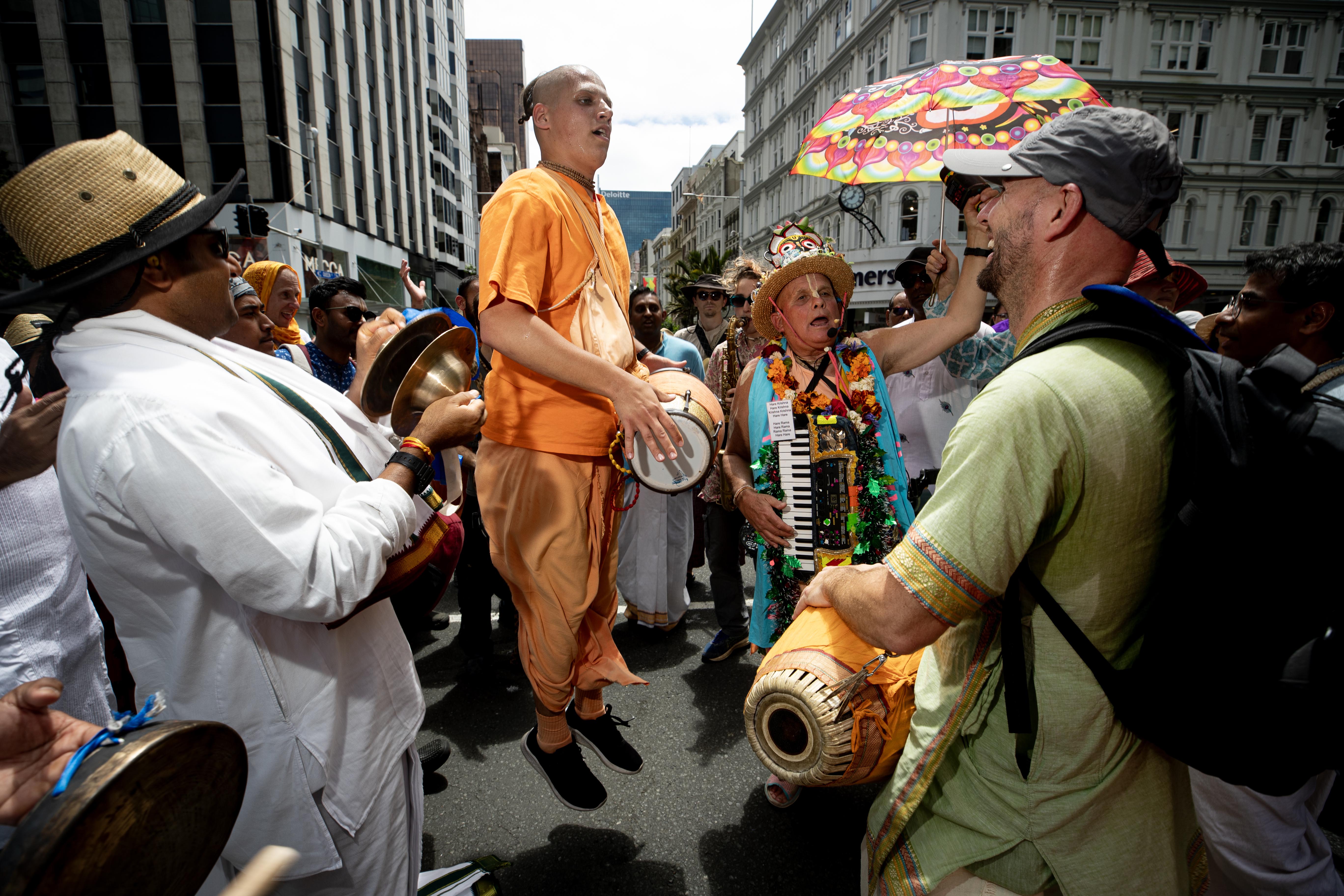 The Auckland Hare Krishna community gather on Queen Street, Auckland City to celebrate Ratha Yatra, which involves a grand chariot procession of Lord Jagannatha, Baladeva, and Subhadra. This vibrant street festival exemplifies unity, and the Divine's journey touches hearts along the way.  By Dean Purcell - NZ Herald photographer