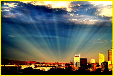 Stephen Hardy; Auckland City light show; Taken in the evening from Ponsonby Road as the sun behind me was going down producing a once in a life time light show not photoshop just the wonder of nature at its best.