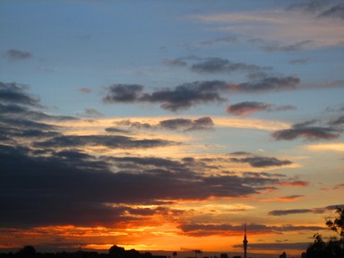 Rob Macmillan; A rich sunset provides a striking backdrop to the Skytower. Shot from my street in Meadowbank.