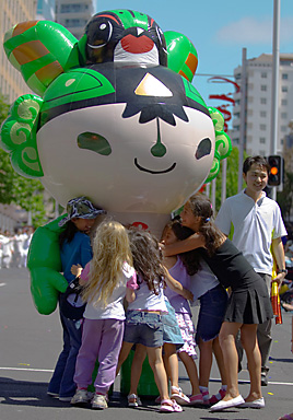 John Ling; every kids Love the Mascot; in Xmas Parade in Auckland