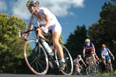 Doug Humby; Everyone's a winner!; 100K cycling bunch take a fast Clevedon corner.