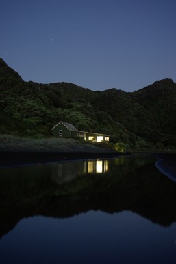 Brett Dickson; Karekare Surf Club; Karekare Surf Club building an hour after sunset