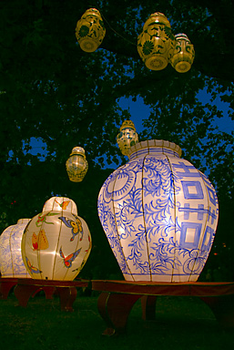 John Ling; Lanterns in the festival; Many people loves to take photo on the lanterns in the festival. I waited for long time to get the right moment when the sky is just darker than the lantern light but still light up a little on the tree. But the power was out for 2 times when almost just the right time to the photos!