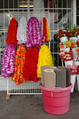 Darius Mccallum; Shop Front; Colourful knicknacks for sale at Manukau City