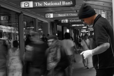 Jae Young Shim; Silent Smile; A street performer looks as if he is smiling as people pass by on busy Queen St.