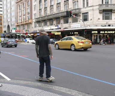 Sylvie Taylor; Skateboarding Mayhem; My first photo is from the bottom of Queen Street, I think it represents Auckland in the way that its known as a city full of cars and yet when you're not old enough to drive a car, any form of transport is resorted to.