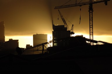 Roy Fernley; Sunset over the City; taken from The Mirage Apartments looking towrds the Vector Arena building site