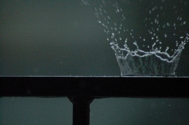 Scottie Peng; Raindrop??; Raindrop on the hand rail of my apartment balcony