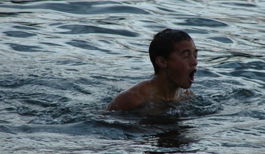 Ramona Radford; I am water; This photo was taken at Pupuke Lake, Takapuna right on dusk. The kids were told to hop out of the water but they took off in the opposite direction for another ten minutes in the cold, clear water.