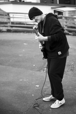 Musa Nor Azmi; Music to My Ears; This guy is performing on the streets for some change. This is taken at the traffic lights near St Paul church while i was walking home from university.