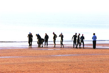 Jerry Zinn;Swimmers on Takapuna beach.; An early morning swim