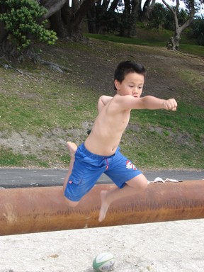 Marie Su'a; Superman in motion @ Pt Chev; Flight is not limited to the birds @ Pt Chev beach