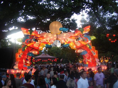  A traditional celebration under the ever watchful gaze of the skytower, whose promise of possible fortune has had a devastating effect on some of the chinese community.     inese