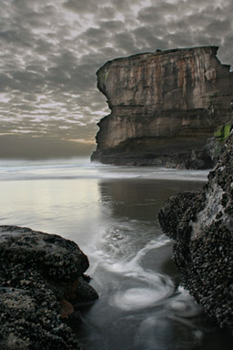 Steve Nicoll;Motutara Swirl;Motutara Island from Maori Bay. Taken with a slow shutter speed to capture the mood and water movement.