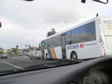 Winifred Struthers; Richies bus at the corner.