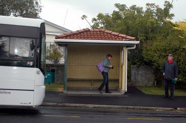 Andrew Brodie; At the bus stop.