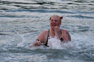 Karen Williamson; Mid Winter Swimmer; The shock of hitting ice cold water is evident on this swimmers face. Sandspit Mid Winter Swim.