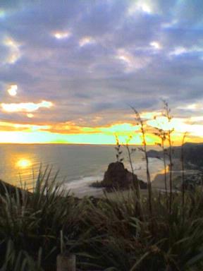 naleen; piha; i took this photo of piha beach during sunset on cellphone