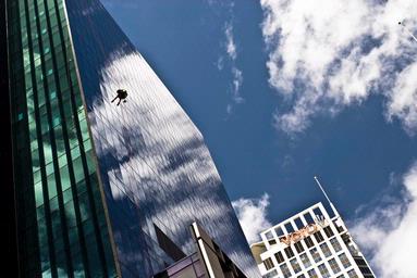 Javier; Spiderman; A worker dancing and cleaning the building at the same time