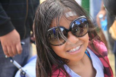 beautiful young pacific girl enjoying her day with her family.