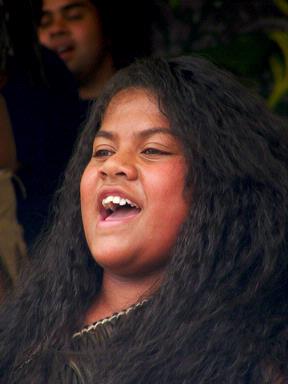 Linda Lew;Graceful sing song;A beautiful singer during a performance on the Niue stage. Polyfest 2010