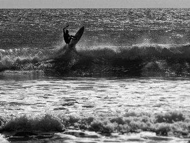 dennis william gaylor;working the break off Camel Rock   Piha ; roaring 40's style