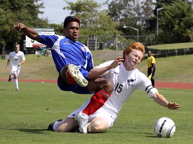 Grant Stantiall; The Tackle; New Zealand U20 captain Dan Keat is tackled during a match against Samoa at Trusts Stadium, Waitakere.