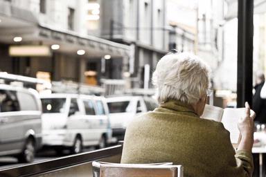 Nik Nurhidayah Nik Wahid;A Nice Book on A Nice Day;A photo of a lady enjoying a nice quiet time at a cafe on High St in the bustling city of Auckland.