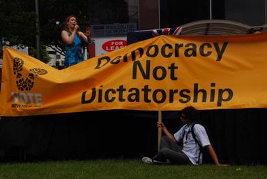 Paras Kumar;politics; Using the lure of showbiz to attract crowd at political rallies is not uncommon. Taken during 'March for Democracy' in Auckland.