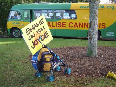 Kim Symonds; Perhaps the parents had gone for a quick smoke? SH20 protest placard left on pram during protest against Minister Joyce decision