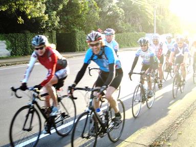 JERRY ZINN; EARLY MORNING RIDERS; HAPPY BUNCH OUT FOR AN EARLY BIKE RIDE