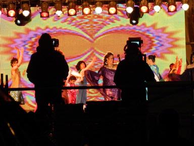 JD; Musical extravaganza; Mika's show in the CBD, lights, dance, cameras