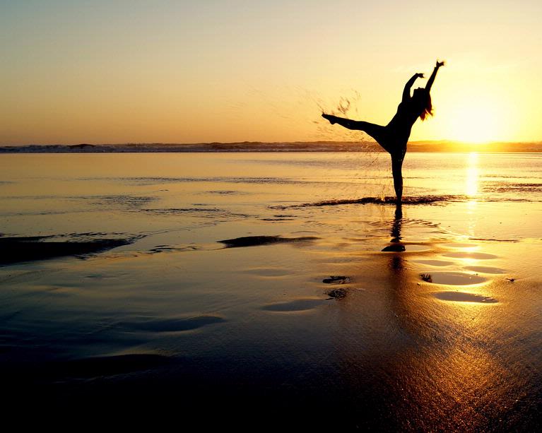Mirjam van Sabben; Dancing Freely At Piha During Sunset;I capture this of my friend Katie dancing as the sun set over Piha beach