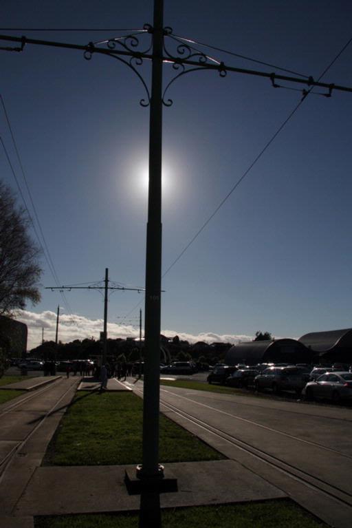 Jasmin Sheikh; Waiting for a ride; We were waiting for a tram at MOTAT. When I looked up at the old styled pole and a sun just behind it, I thought that's work recording. so here we go
